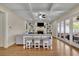 Bright living room with built-in shelving and a fireplace, opening to an outdoor patio at 4256 Weaver Se St, Smyrna, GA 30080