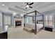 Elegant main bedroom with fireplace, ceiling fan, and lots of natural light at 4256 Weaver Se St, Smyrna, GA 30080
