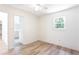 Bright bedroom features hardwood floors, and an ensuite bathroom at 737 Polk Nw St, Marietta, GA 30064