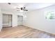 Bright bedroom features hardwood floors, walk-in closets and a window at 737 Polk Nw St, Marietta, GA 30064