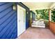 Inviting front porch with swing and traditional accents at 737 Polk Nw St, Marietta, GA 30064