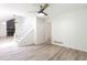 Neutral living room showcasing vaulted ceiling and wood-look flooring at 737 Polk Nw St, Marietta, GA 30064