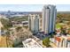 Aerial view of high-rise towers and surrounding lush landscape, showcasing a vibrant community at 795 Hammond Dr # 1012, Atlanta, GA 30328