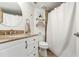 Bathroom featuring a white vanity, granite countertops, and a shower with white curtain at 795 Hammond Dr # 1012, Atlanta, GA 30328