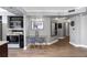 Kitchen and dining area featuring sleek appliances, modern lighting, and wood flooring at 795 Hammond Dr # 1012, Atlanta, GA 30328