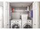 Laundry room featuring a new washer and dryer and storage space at 795 Hammond Dr # 1012, Atlanta, GA 30328