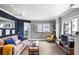 Comfortable living room featuring hardwood floors, large windows, and stylish decor at 795 Hammond Dr # 1012, Atlanta, GA 30328