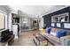 Living room featuring wood floors, elegant furnishings, and contemporary decor at 795 Hammond Dr # 1012, Atlanta, GA 30328