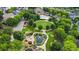 Aerial view featuring a pond, pool, walking trails, and mature landscaping in the community at 1622 Gates Nw Pl, Atlanta, GA 30318