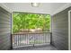 Private balcony overlooking a landscaped backyard at 1622 Gates Nw Pl, Atlanta, GA 30318