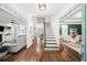 Spacious foyer with hardwood floors, staircase, and an open layout to the living areas at 1622 Gates Nw Pl, Atlanta, GA 30318