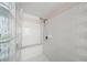 Bright shower featuring glass blocks and subway tile at 1622 Gates Nw Pl, Atlanta, GA 30318