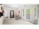 Cozy sitting room with access to a private balcony at 1622 Gates Nw Pl, Atlanta, GA 30318