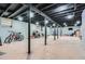 Unfinished basement space with exposed ceiling, painted support columns, and ample room for storage or customization at 8767 N View Dr, Lithia Springs, GA 30122