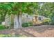 Charming single-story home with well-maintained landscaping and a covered front porch at 8767 N View Dr, Lithia Springs, GA 30122