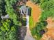 Newly built house in a private wooded setting with a long driveway and plenty of space at 2335 Azalea Dr, Loganville, GA 30052