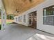 Spacious covered patio with ceiling fans, offering seamless indoor-outdoor living at 2335 Azalea Dr, Loganville, GA 30052
