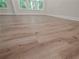 Close-up showcases the attractive and durable hardwood flooring throughout the home at 2335 Azalea Dr, Loganville, GA 30052
