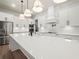 Spacious kitchen featuring a large island with countertops and modern stainless steel appliances at 2335 Azalea Dr, Loganville, GA 30052