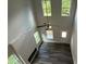 Bright living room boasting soaring ceilings, a modern fireplace, and large windows overlooking the backyard at 45 Heyman Dr, Covington, GA 30016