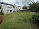 Large manicured backyard with room for activities and entertaining at 640 Dahoma Trl, Woodstock, GA 30188