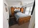 This spacious bedroom features carpeted floors, a ceiling fan and large window letting in natural light at 640 Dahoma Trl, Woodstock, GA 30188