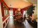 Dining room with hardwood floors, chandelier and view to the backyard at 640 Dahoma Trl, Woodstock, GA 30188