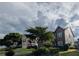 Beautiful two-story home nestled amongst mature trees and lush landscaping at 640 Dahoma Trl, Woodstock, GA 30188
