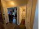Hallway leading to bathroom and formal living room with dark wood flooring at 640 Dahoma Trl, Woodstock, GA 30188