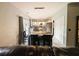 Bright eat-in kitchen with marble floors, granite counters, island and stainless steel appliances at 640 Dahoma Trl, Woodstock, GA 30188