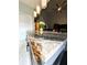 Modern kitchen island featuring granite countertops, pendant lighting and ceiling fan at 640 Dahoma Trl, Woodstock, GA 30188