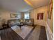 Cozy living room with plush sectional sofa and a view of the front door at 640 Dahoma Trl, Woodstock, GA 30188