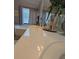 The bathroom is designed with double sinks, a bathtub, and a refreshing bright atmosphere at 640 Dahoma Trl, Woodstock, GA 30188