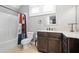Bathroom featuring an enclosed shower and granite vanity with bright natural light at 150 Seals Rd, Dallas, GA 30157