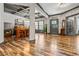 Inviting foyer area with beautiful hardwood floors, custom trim and natural light at 150 Seals Rd, Dallas, GA 30157