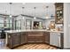 Open-concept kitchen with a large island, stainless steel appliances, and a view into the living area at 150 Seals Rd, Dallas, GA 30157