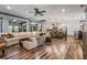 Spacious living room with open view into kitchen and dining area at 150 Seals Rd, Dallas, GA 30157