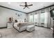 Comfortable main bedroom featuring a plush bed, soft carpet, and plenty of natural light at 150 Seals Rd, Dallas, GA 30157