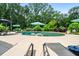 Relaxing backyard with tanning chairs and crystal blue pool at 150 Seals Rd, Dallas, GA 30157