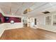 Spacious basement featuring unique billiard-themed wall art and wood-look flooring at 402 Clyde Ct, Mcdonough, GA 30252