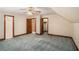 Bedroom features neutral walls, closet, ceiling fan, and wood trim at 402 Clyde Ct, Mcdonough, GA 30252