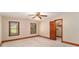 Bright bedroom featuring two windows and wood trim, offering natural light and a serene atmosphere at 402 Clyde Ct, Mcdonough, GA 30252