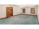 Bedroom with carpet flooring and trim plus two windows and a closet with open door at 402 Clyde Ct, Mcdonough, GA 30252