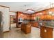 Beautiful kitchen with granite countertops, stainless steel appliances, and wood cabinets at 402 Clyde Ct, Mcdonough, GA 30252