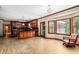 Bright kitchen with wood cabinets and stainless appliances, next to dining area at 402 Clyde Ct, Mcdonough, GA 30252