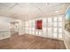 Living room featuring custom built-in cabinets and vinyl flooring at 402 Clyde Ct, Mcdonough, GA 30252