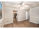 Spacious living room showing luxury vinyl flooring and neutral walls at 402 Clyde Ct, Mcdonough, GA 30252