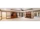Spacious living room with brick fireplace, built-ins, and wood trim at 402 Clyde Ct, Mcdonough, GA 30252