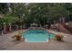 Backyard swimming pool with brick accents and a gazebo at 402 Clyde Ct, Mcdonough, GA 30252
