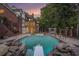 Spacious backyard with a swimming pool and a diving board at 402 Clyde Ct, Mcdonough, GA 30252